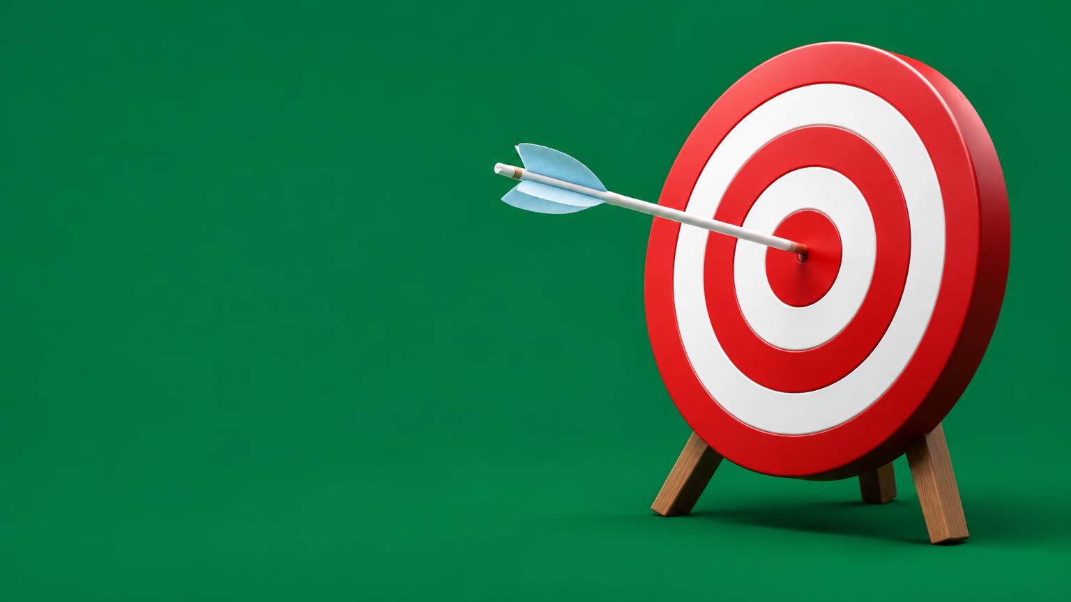 An arrow hitting the center of a sales target